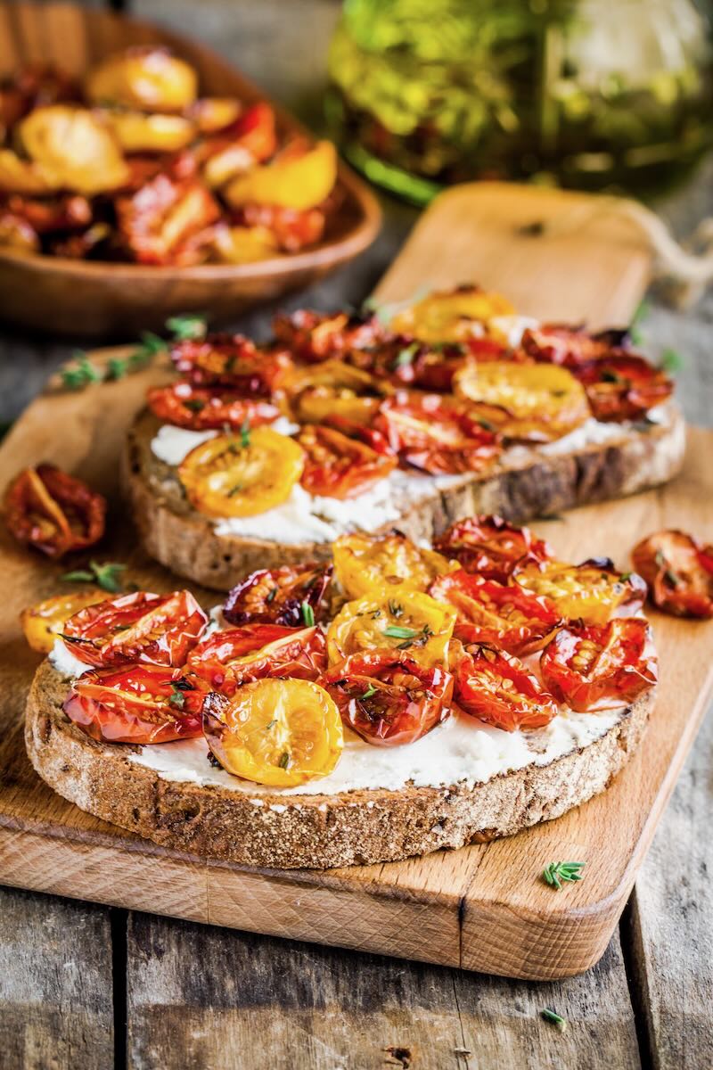 Fresh bruschetta with cream cheese and sun-dried tomatoes