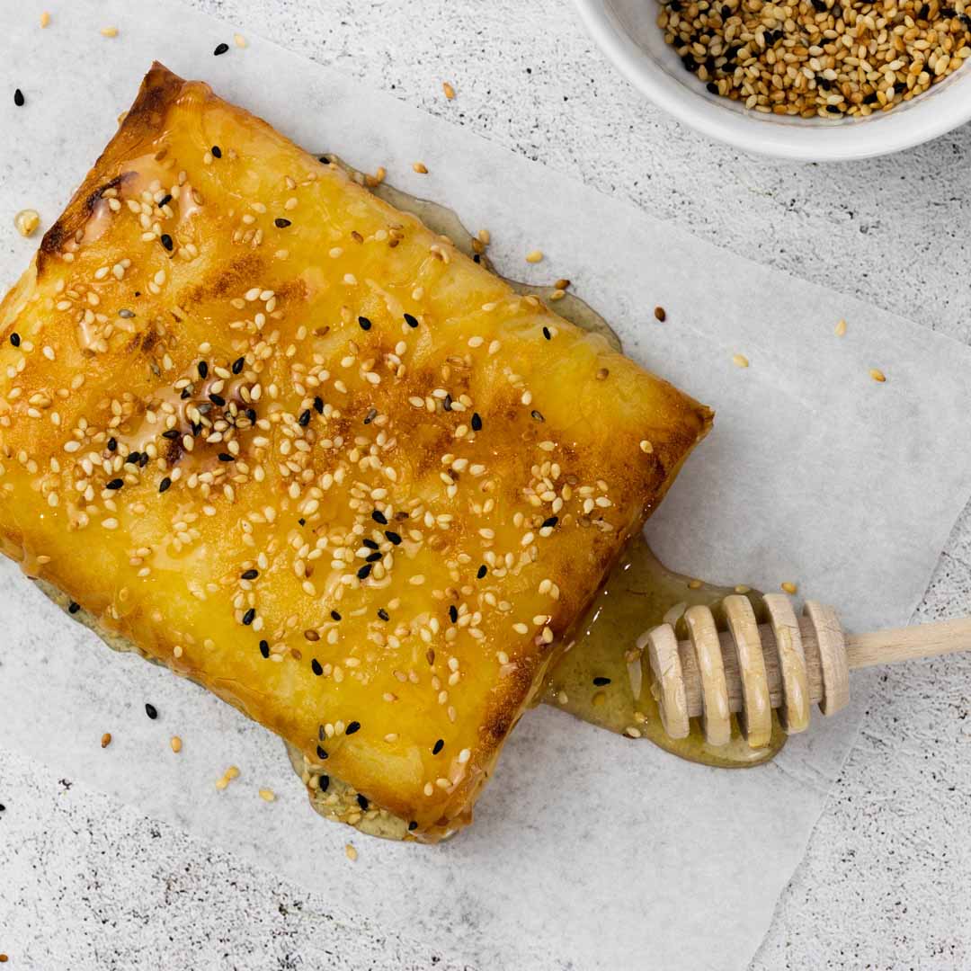 Baked Feta in Filo with Honey and Sesame | fooodlove.com